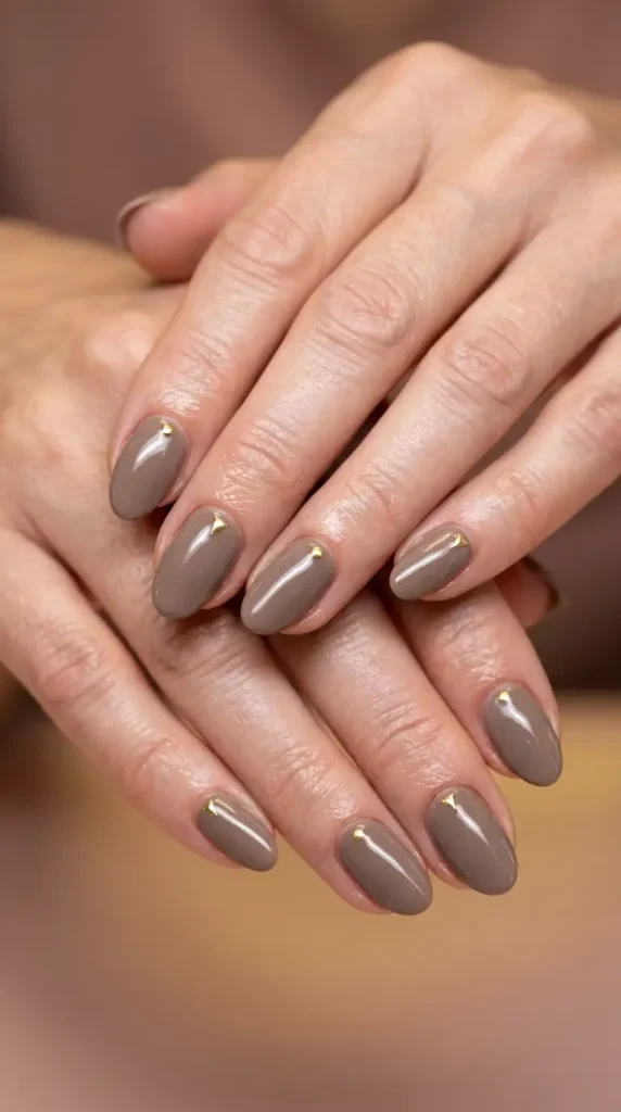 Taupe Oval Nails with Minimalist Gold Art