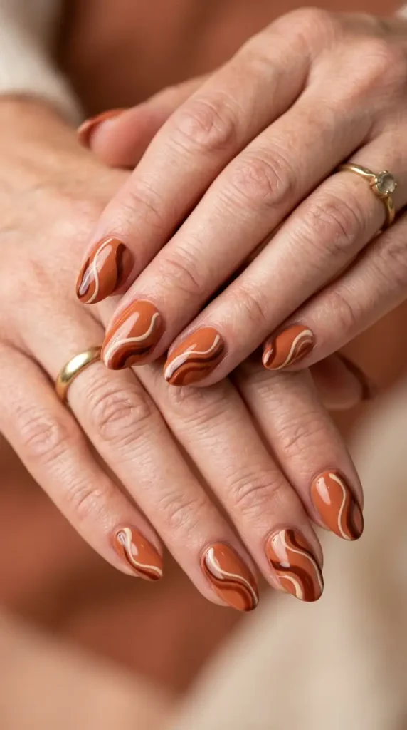 Terracotta Oval Nails with Abstract Swirls