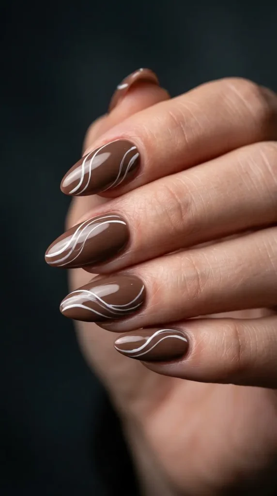 Mocha Nails With White Swirls